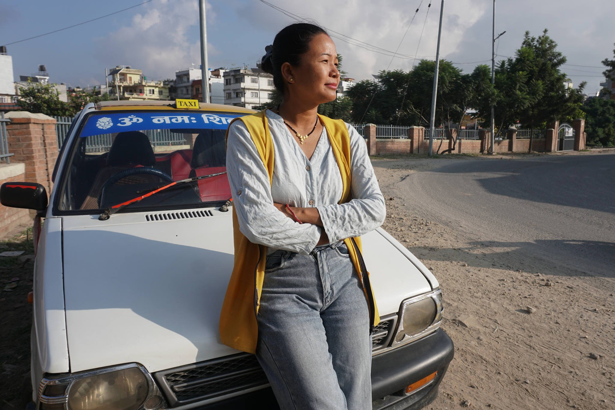 She’s Driving Change as a Taxi Driver on Nepal’s Busiest Streets