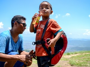 Nepalese Adventurer Paraglides in the Sky But Keeps Feet Planted at Home